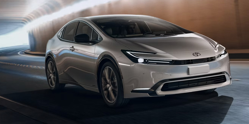 A gray 2025 Toyota Prius Driving through a tunnel.